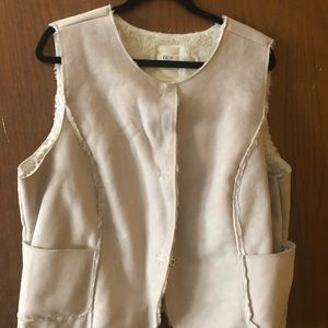 Old Navy cream colored fur vest.